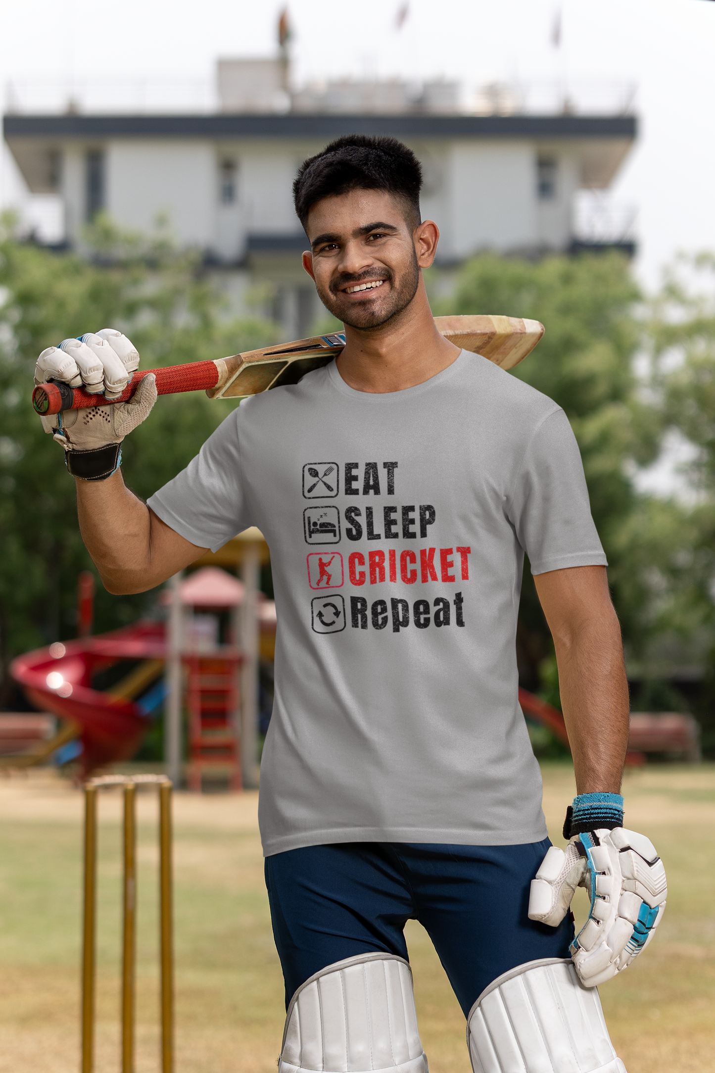 Graphic tee featuring Eat Sleep Cricket Repeat slogan, ideal for Indian cricket enthusiasts
