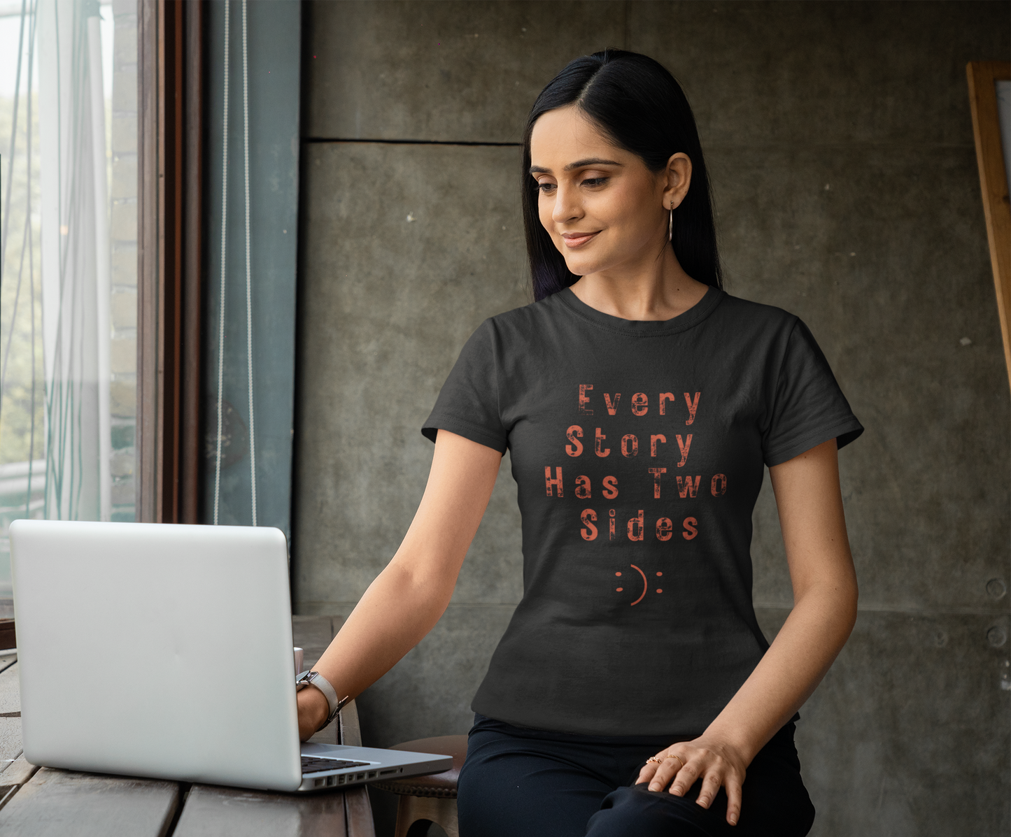 Women’s black graphic t-shirt with ‘Every Story Has Two Sides’ inspirational quote design