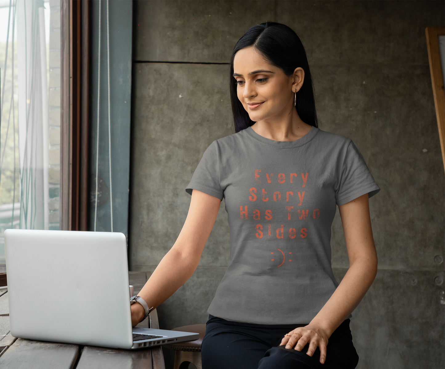 Women’s black graphic t-shirt with ‘Every Story Has Two Sides’ inspirational quote design