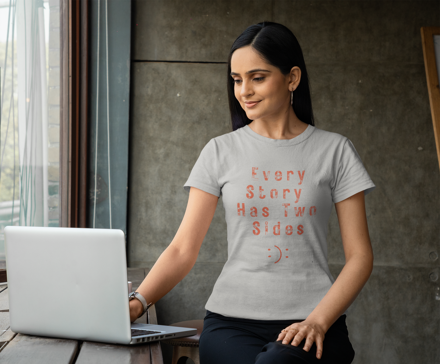 Women’s black graphic t-shirt with ‘Every Story Has Two Sides’ inspirational quote design