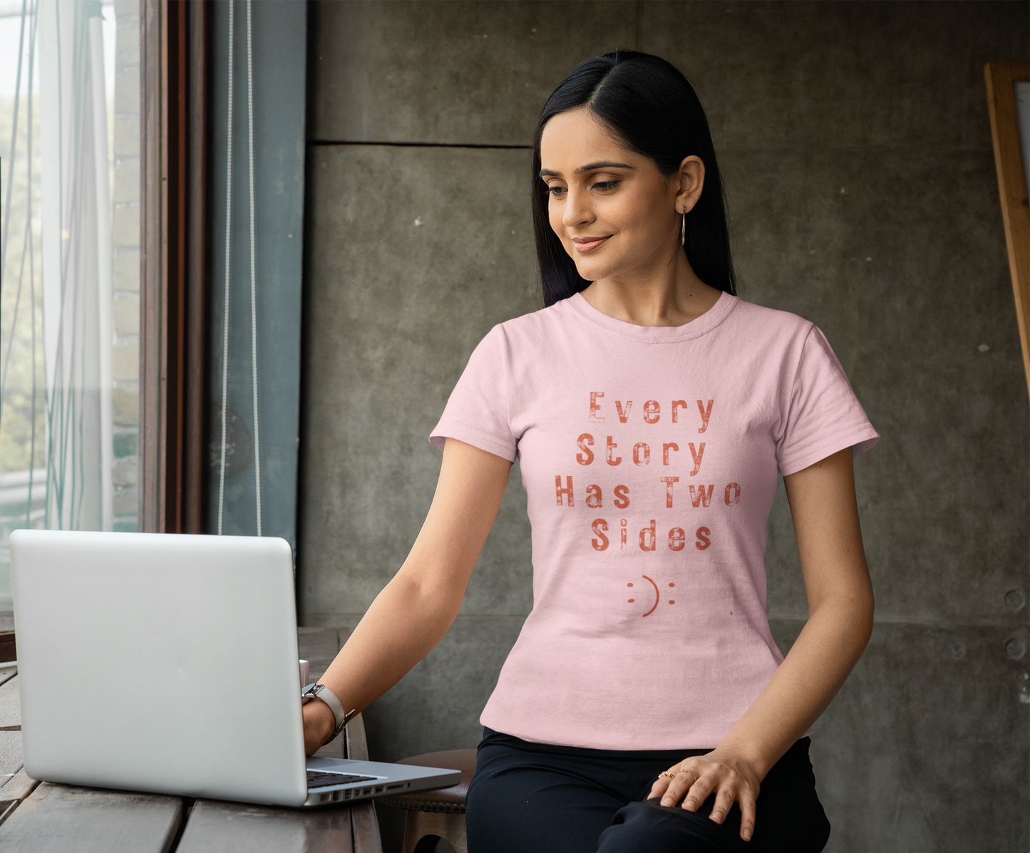 Women’s black graphic t-shirt with ‘Every Story Has Two Sides’ inspirational quote design