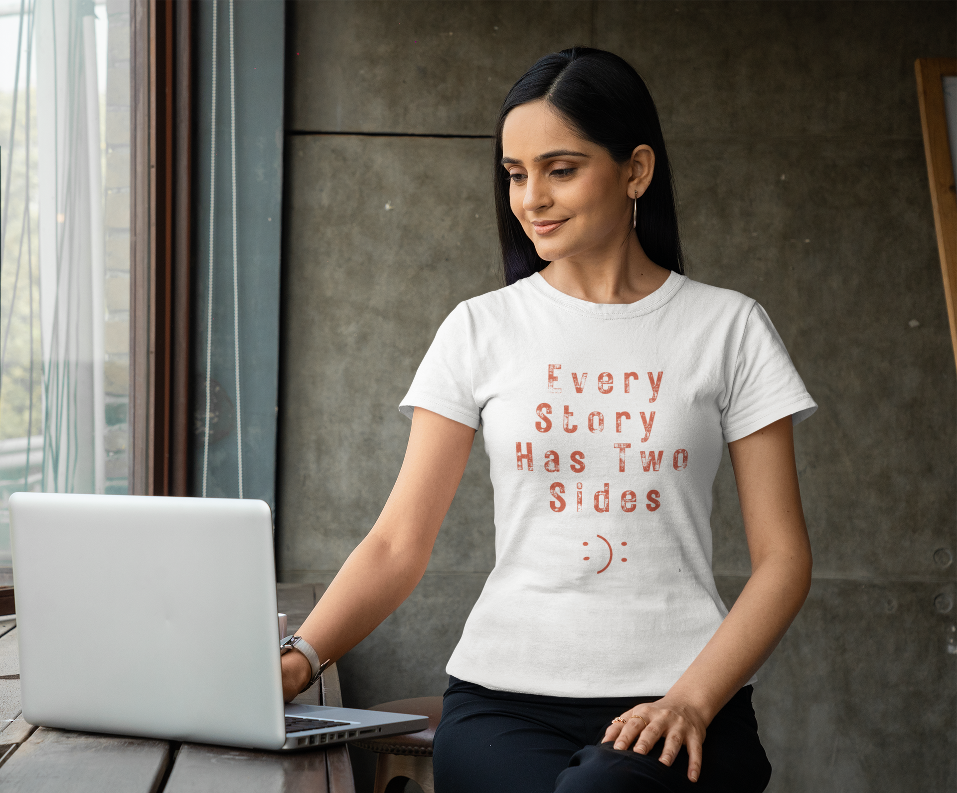 Women’s black graphic t-shirt with ‘Every Story Has Two Sides’ inspirational quote design